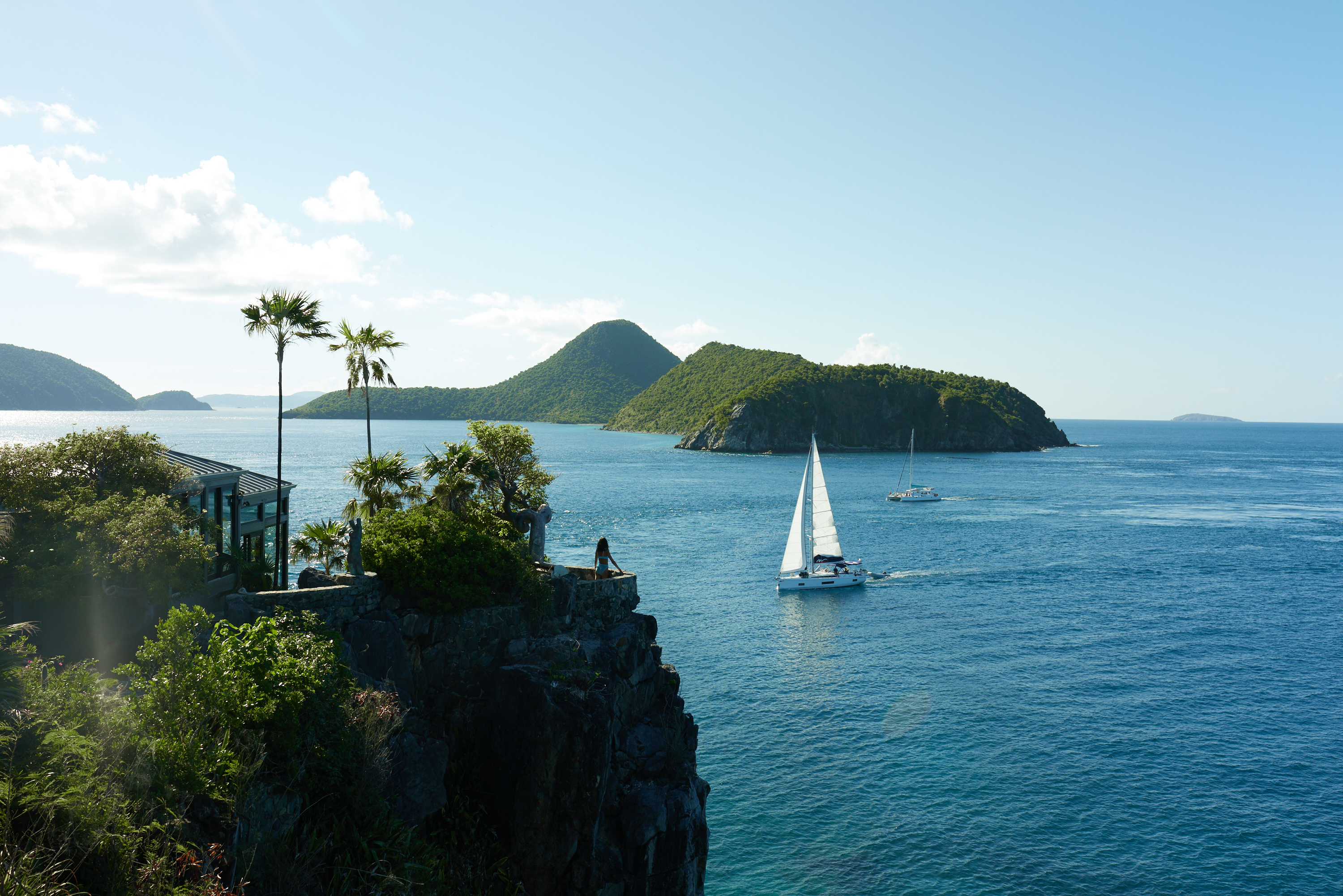 Clifftop hero view with sailboat at Steele Point Villa Tortola BVI