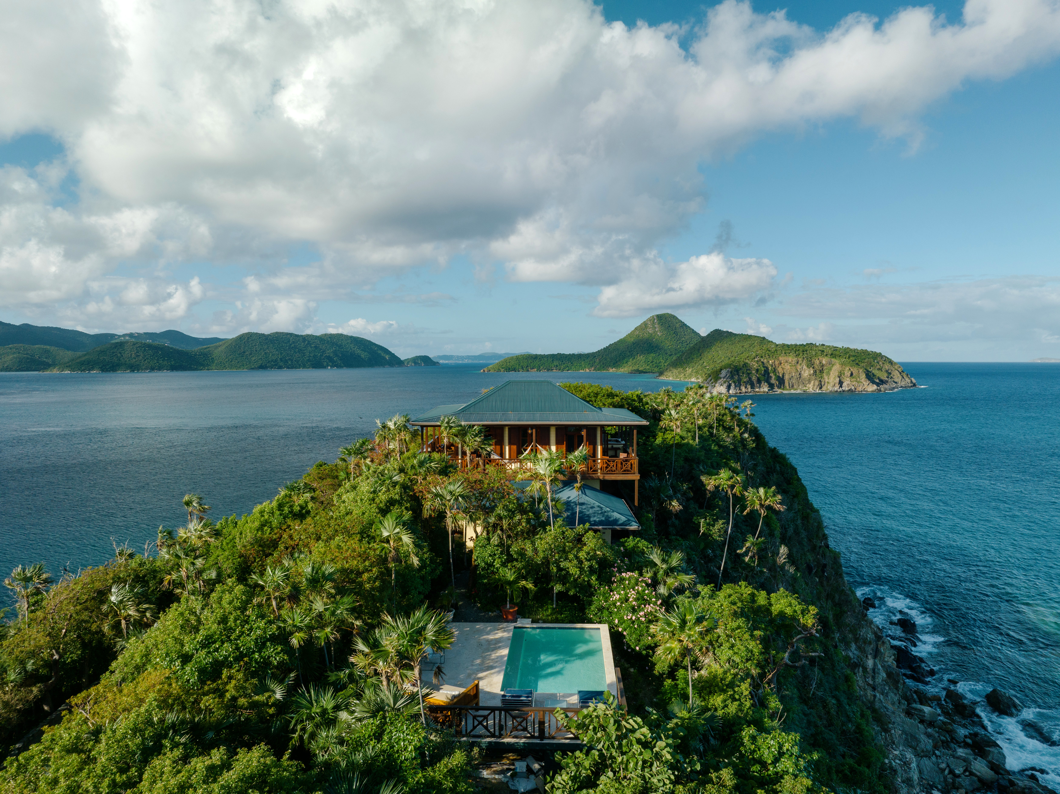 Aerial view of Treehouse at Steele Point with pool and Caribbean coastline